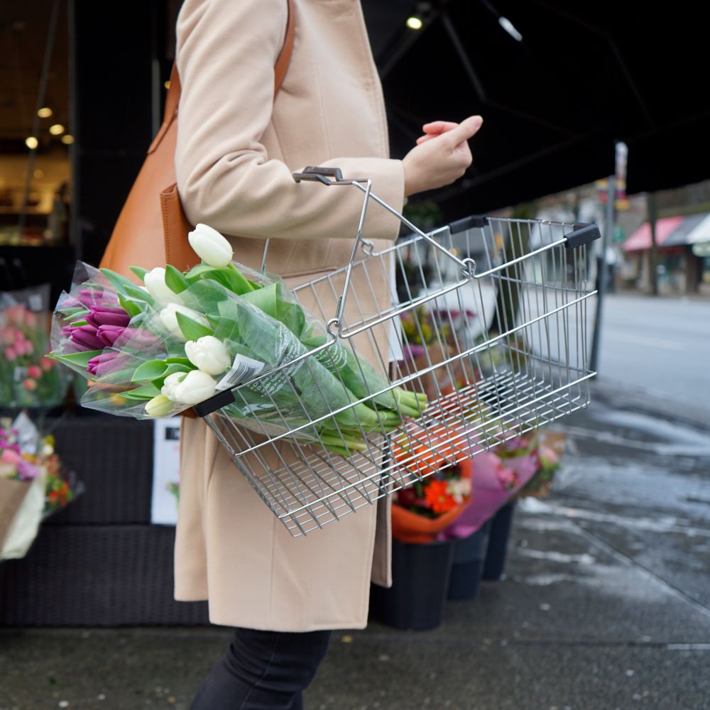 Buckets of fresh stems in a flower shop
